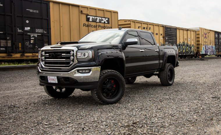 Custom Lifted Black GMC Sierra Truck Near Santa Rosa front view